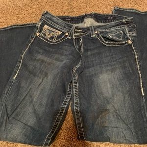 Vigoss Jeans with slight stain on leg.